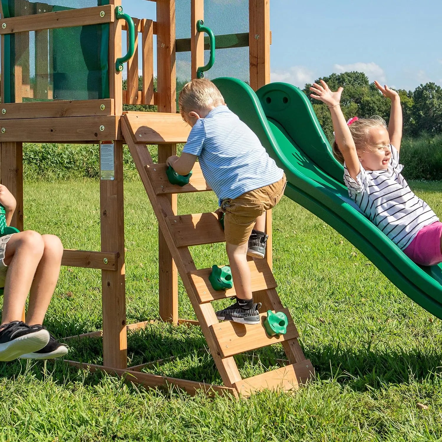 Buckley Hill Cedar Wood Swing Set with Wave Slide, Play Deck, Rock Wall Ladder, Belt Swings, Chalkboard, Canopy Roof, Outdoor Play Center.